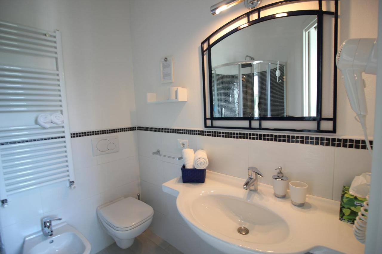 Rooms Il Punto Πεσκιέρα ντελ Γκάρντα Εξωτερικό φωτογραφία
